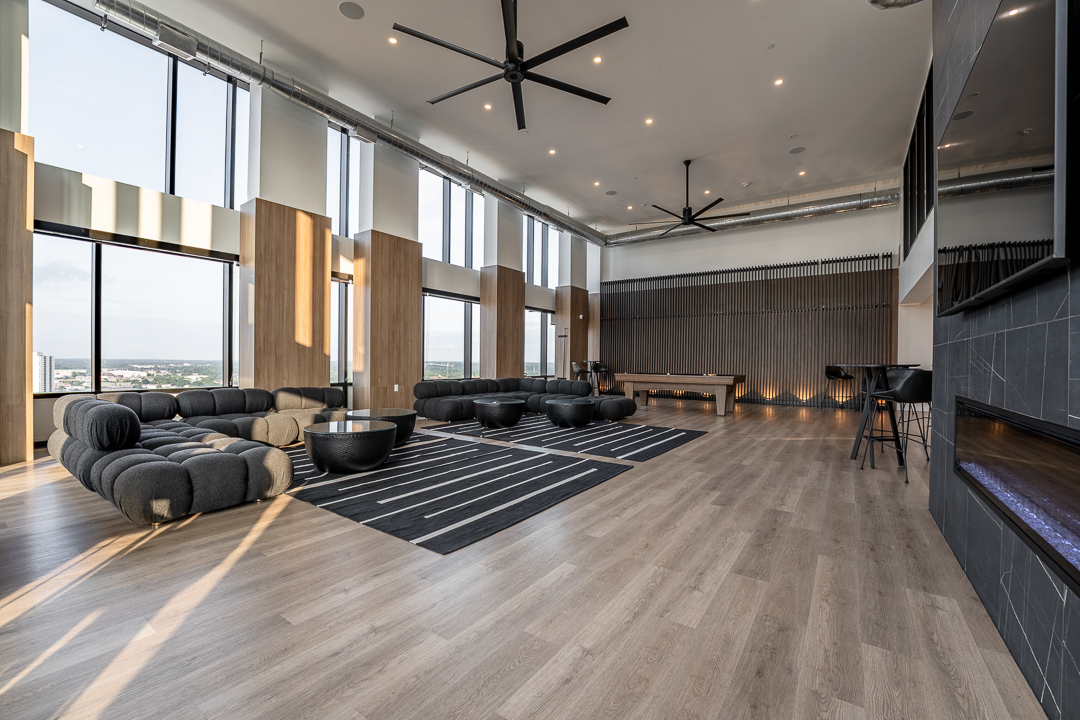 Jewel Lounge with floor-to-ceiling windows, contemporary seating and a pool table